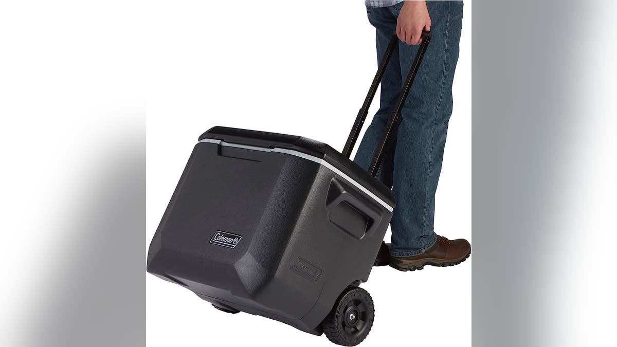 Easily roll your Coleman cooler wherever you want to go.