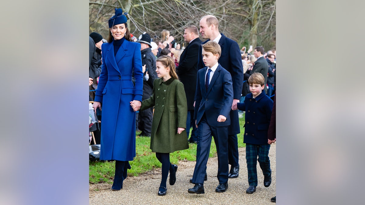 Kate Middleton walking with her family outdoors