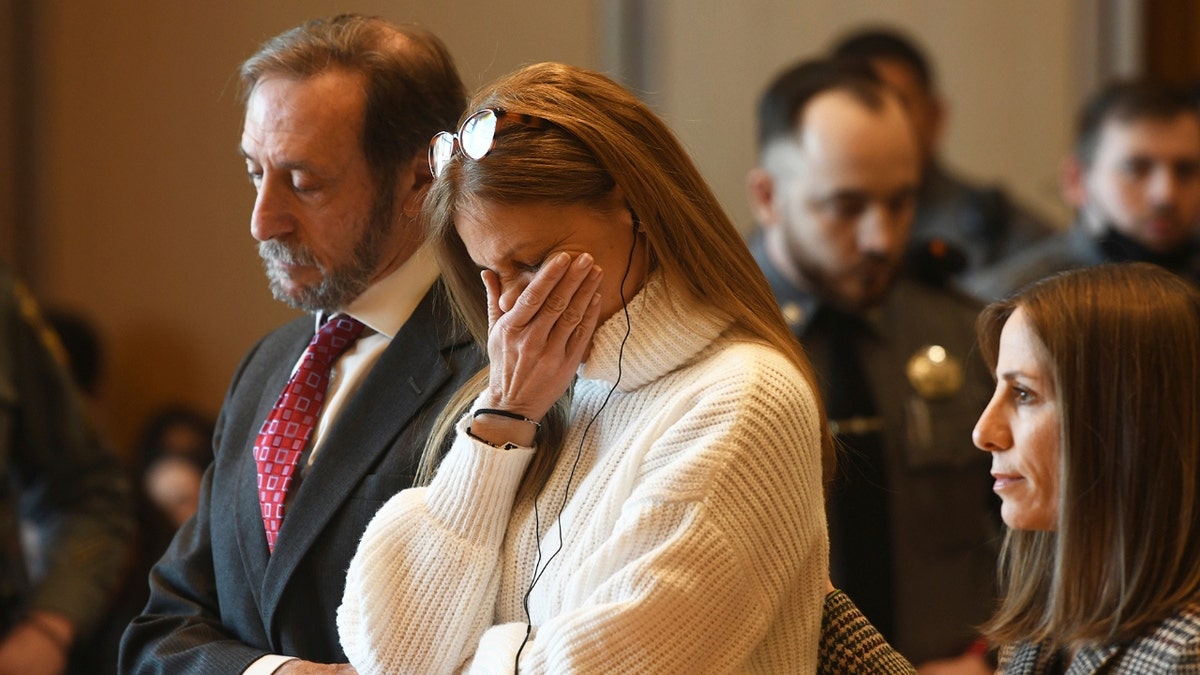 Michelle Troconis listens as a verdict of guilty on all counts is read on the final day jury deliberation for her criminal trial at Connecticut Superior Court in Stamford, Conn. Friday, March 1, 2024.
