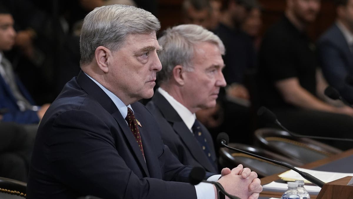 Retired Gen. Mark Milley, left, and retired Gen. Kenneth McKenzie, right