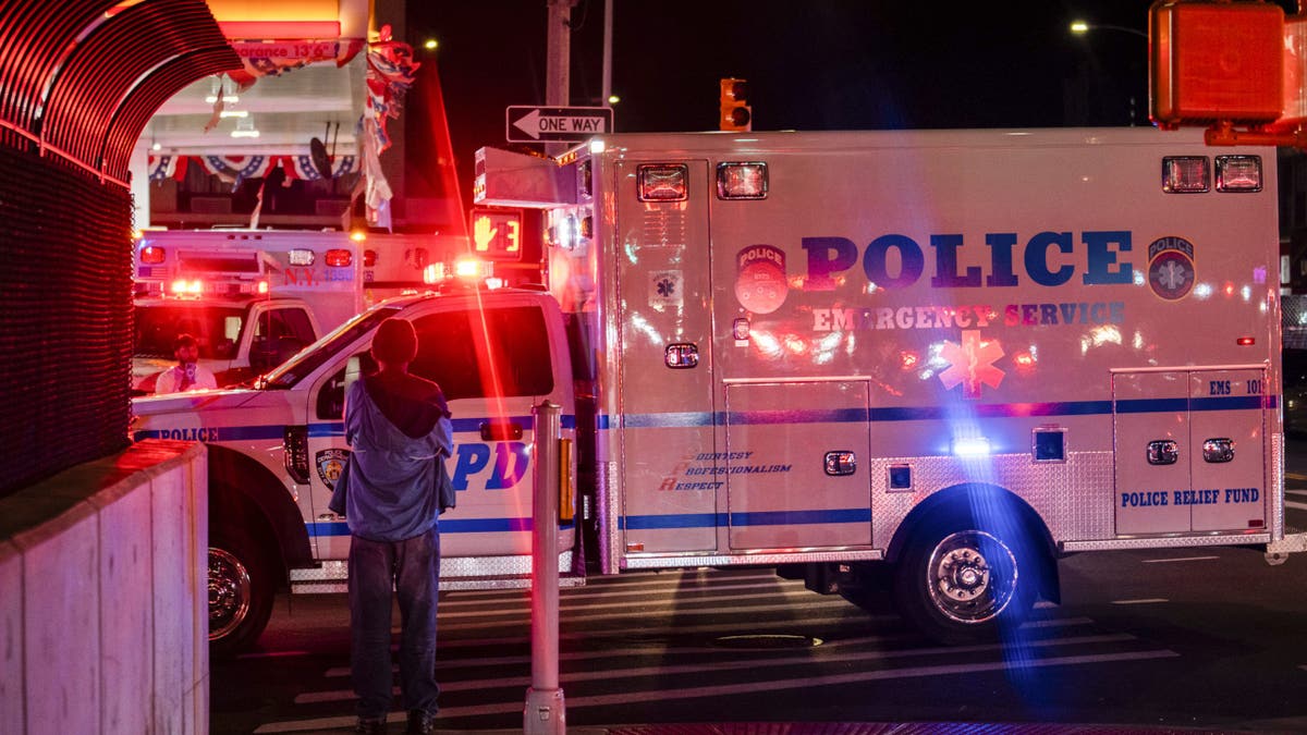 Ambulance transports NYPD Officer Killed in Action, Jonathan Diller