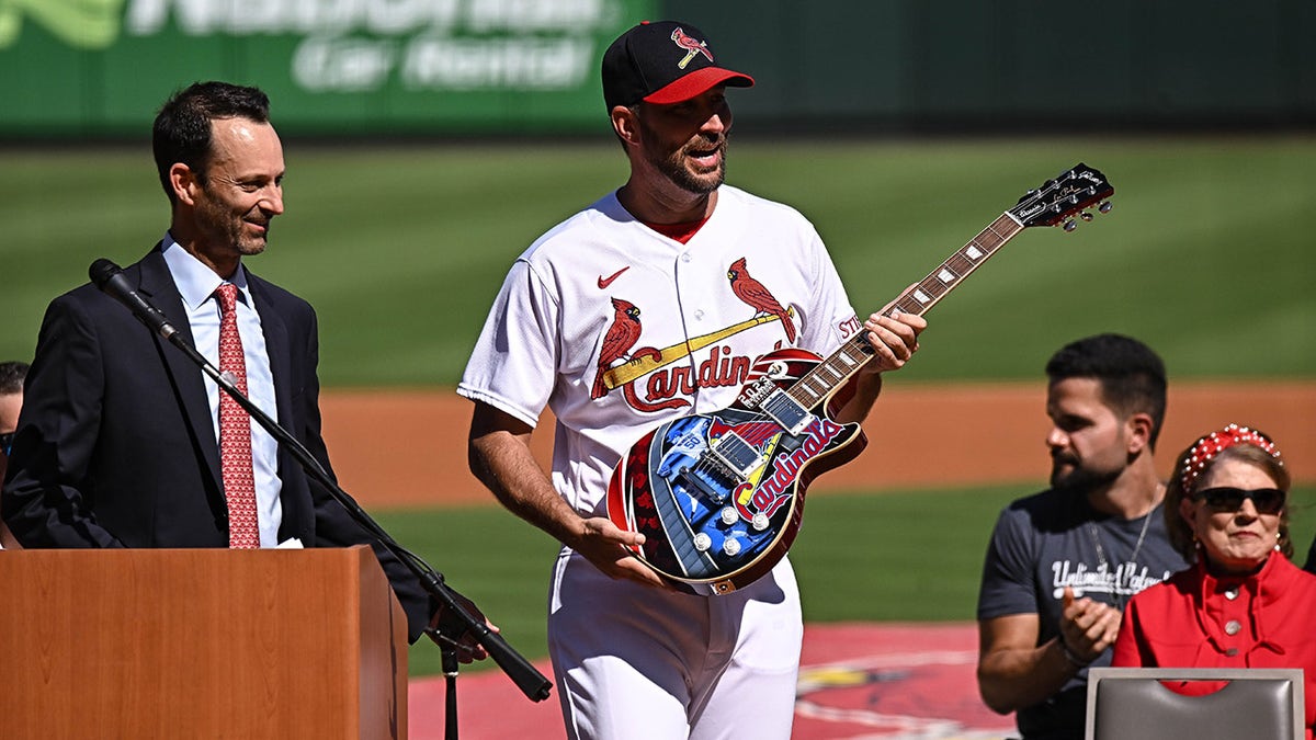 Adam Wainwright receives a guitar