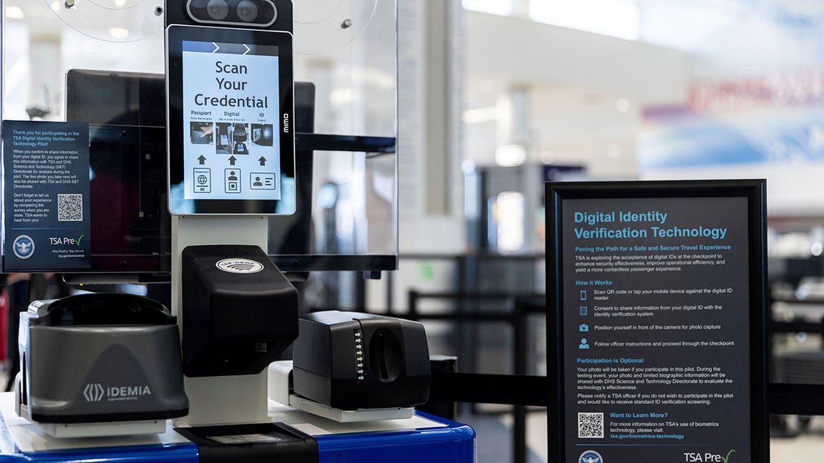 The Transportation Security Administration's new facial recognition technology is seen at a Baltimore-Washington International Thurgood Marshall Airport security checkpoint in Glen Burnie, Maryland. The U.S. government has started requiring migrants without passports to submit to facial recognition technology to take domestic flights.