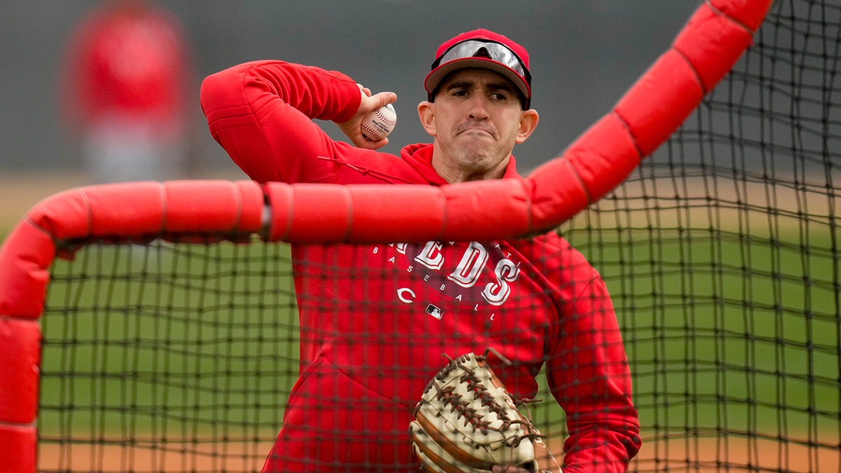 Alon Leichman pitches batting practice