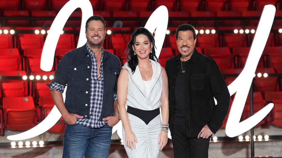 Luke Bryan, Katy Perry, Lionel Richie standing on American Idol set together
