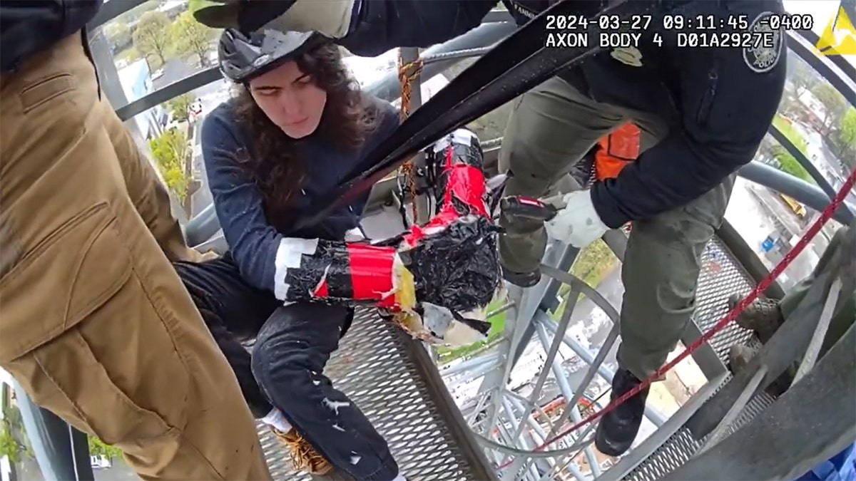 Atlanta tower crane male protester cut free