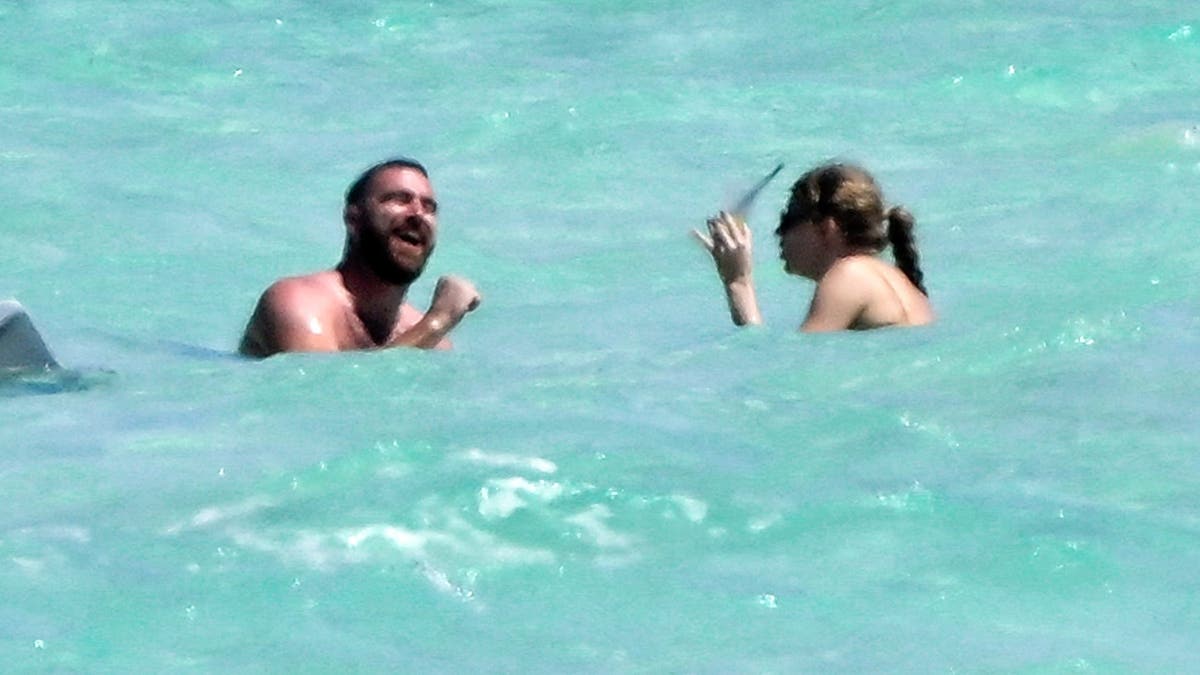 travis kelce and taylor swift swimming