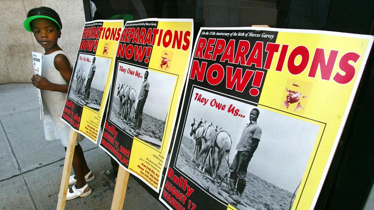 Black reparations protest signs