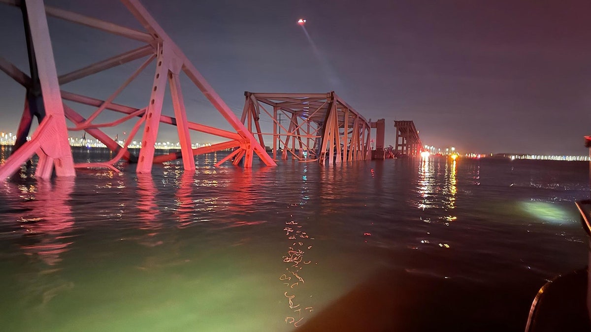 The Francis Scott Key Bridge is seen after collapsing into the water 