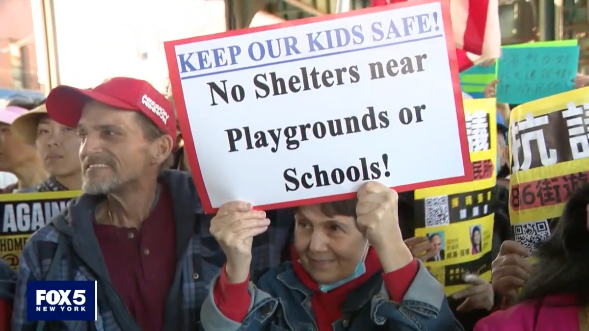 Sign saying 'No shelters near playgrounds or schools!'