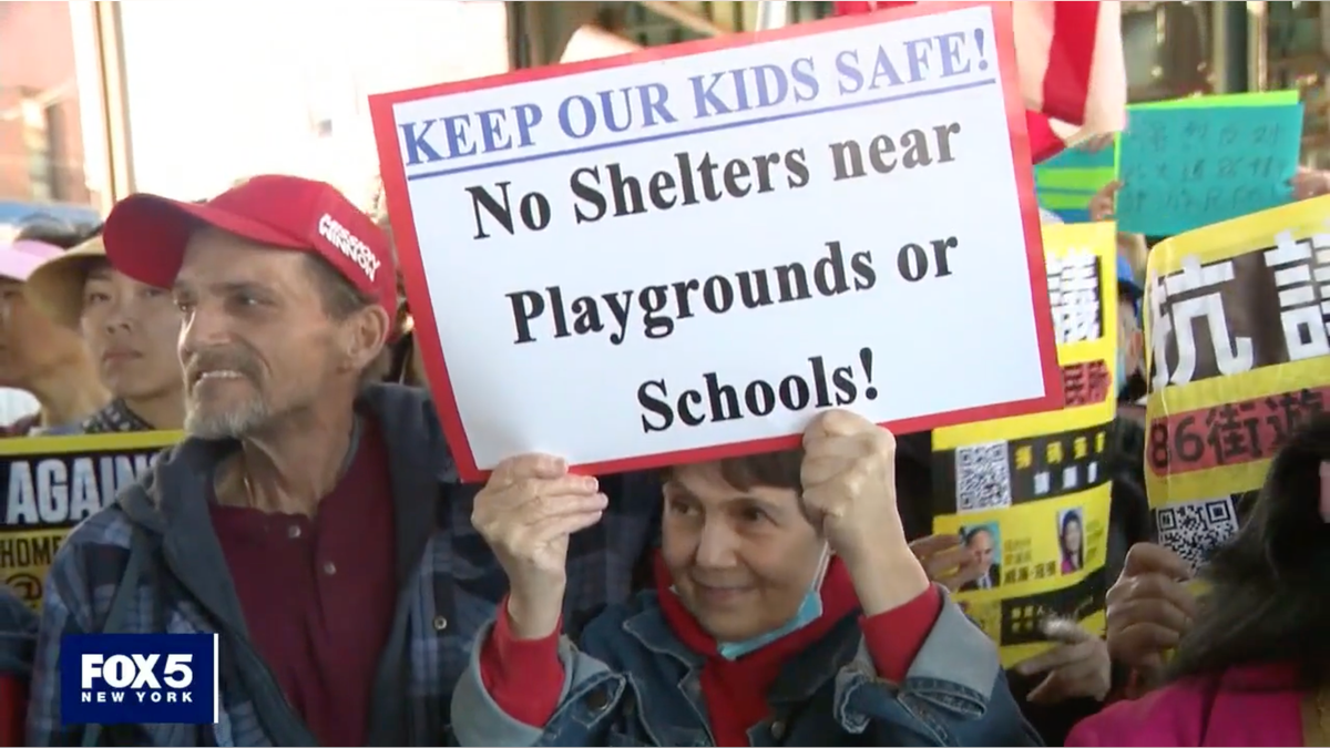 Sign saying 'No shelters near playgrounds or schools!'