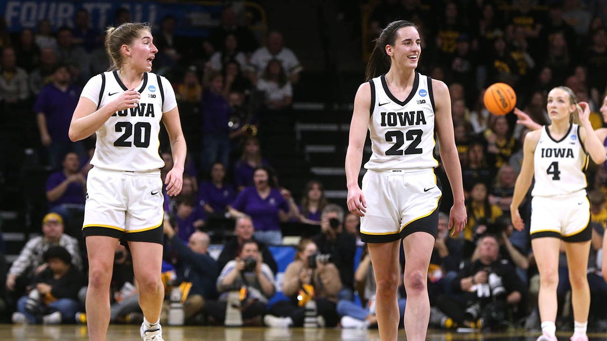 Caitlin Clark reacts during a game