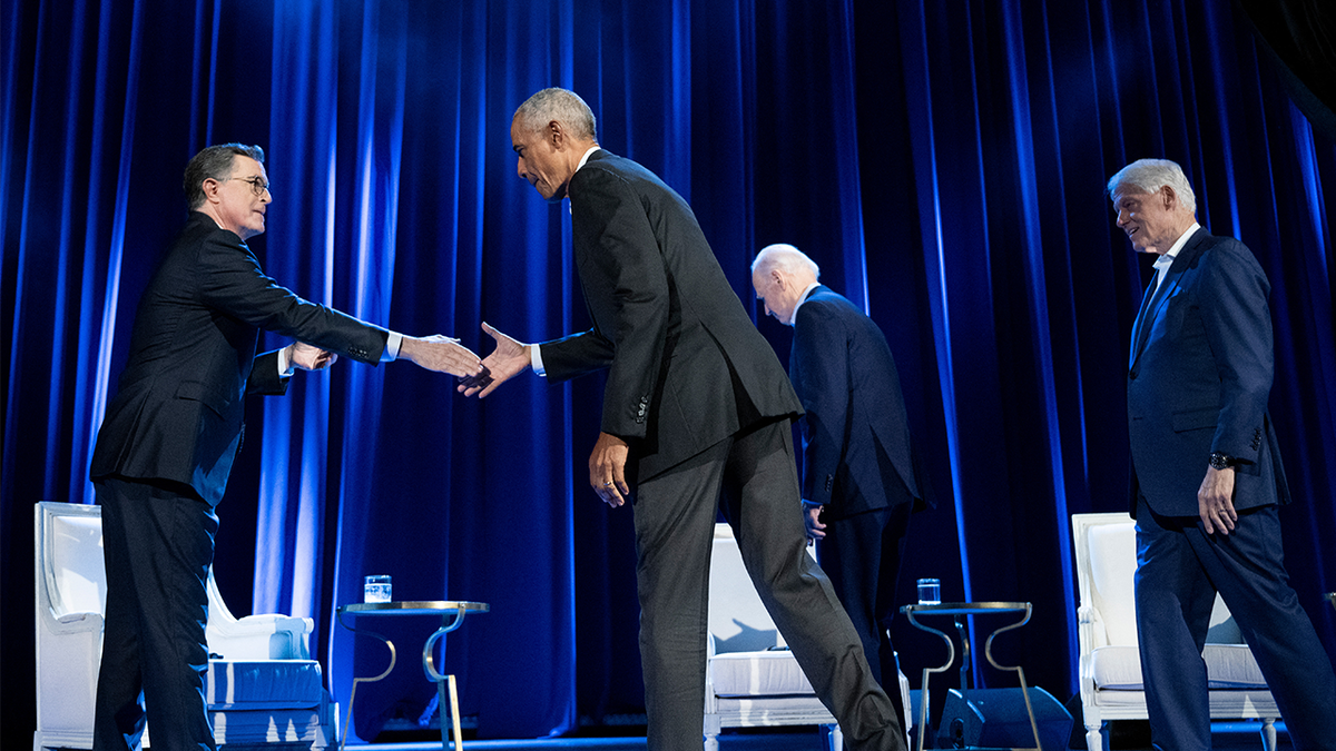 Colbert shakes hands with Obama at Biden fundraiser