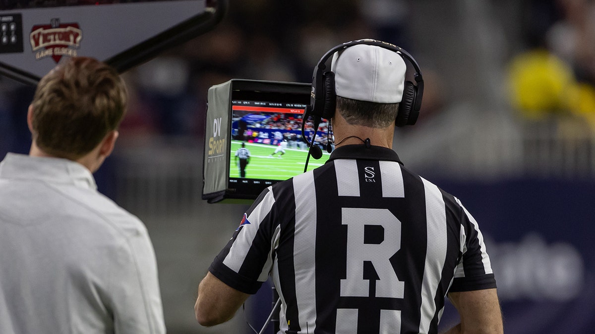 Ref looks at replay