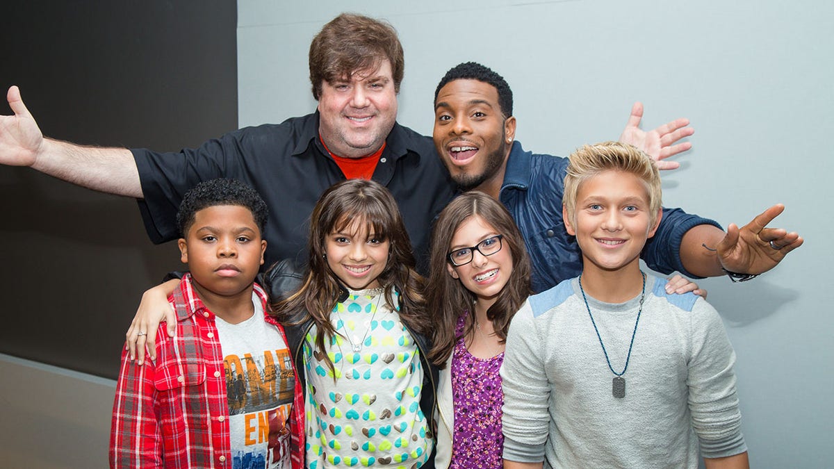 Dan Schenider and Kel Mitchell with children