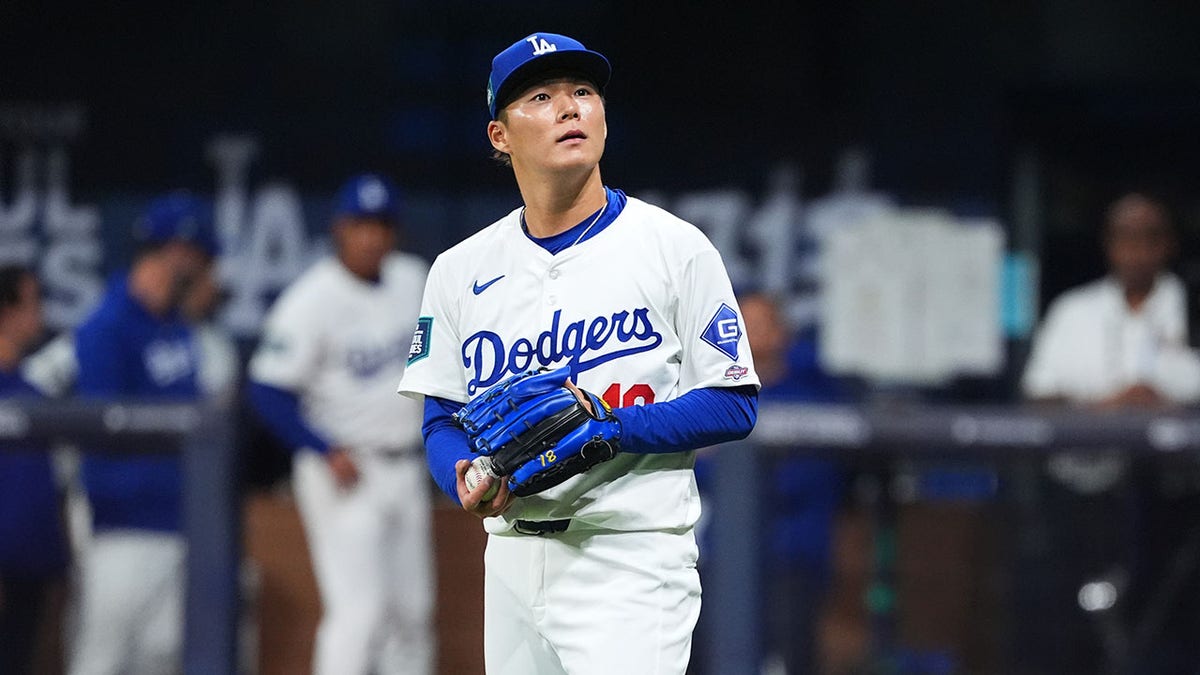 Yoshinobu Yamamoto reacts during a Dodgers game