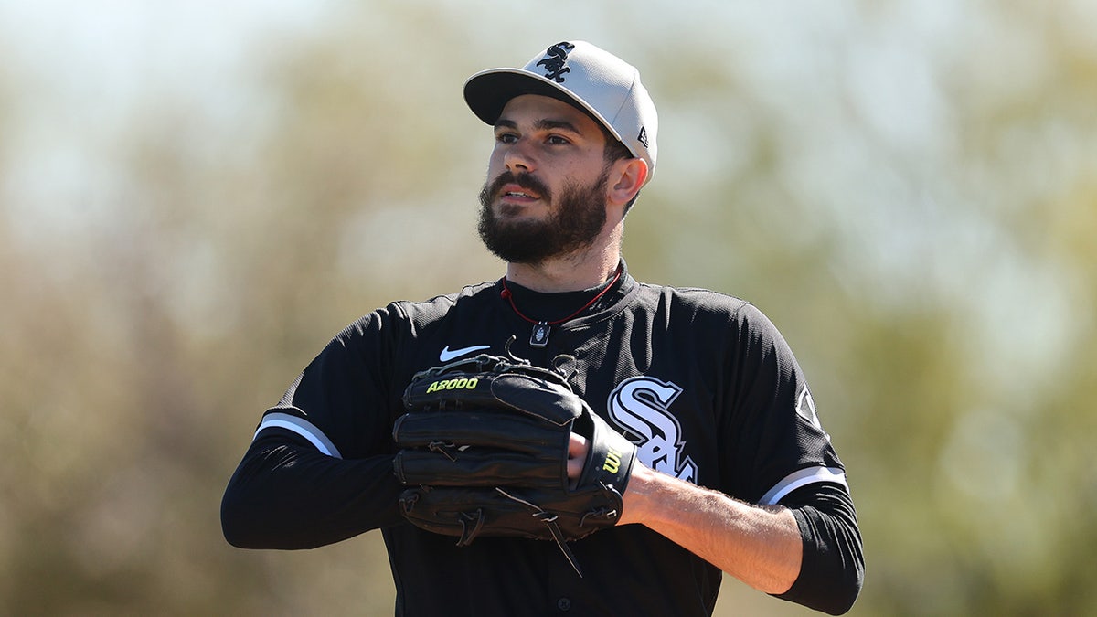 Dylan Cease looks on during a game