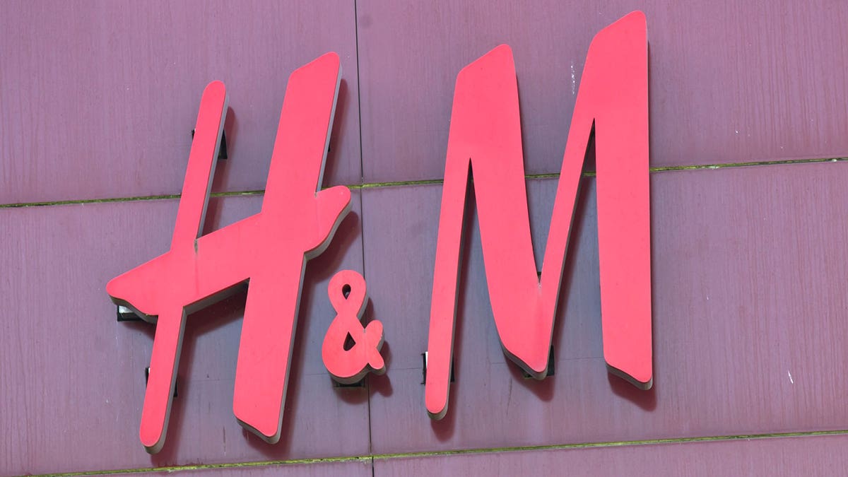The logo of Swedish clothing-retail company Hennes & Mauritz (H&M)