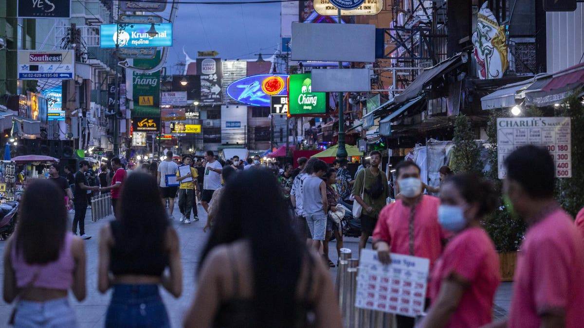 Tourists on street in Bangkok