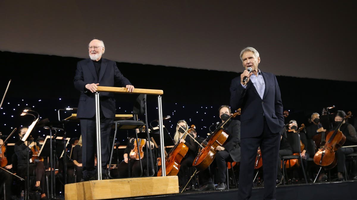 john williams on stage with harrison ford