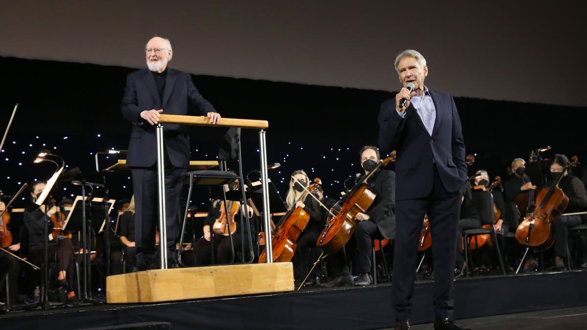 john williams on stage with harrison ford