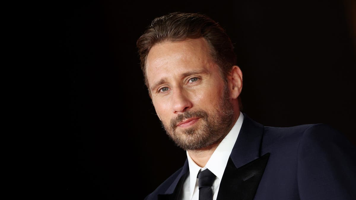 matthias schoenaerts looking to the side