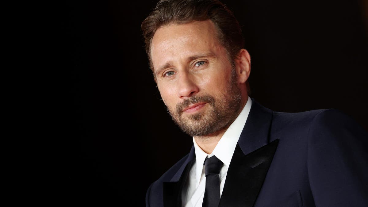 matthias schoenaerts looking to the side