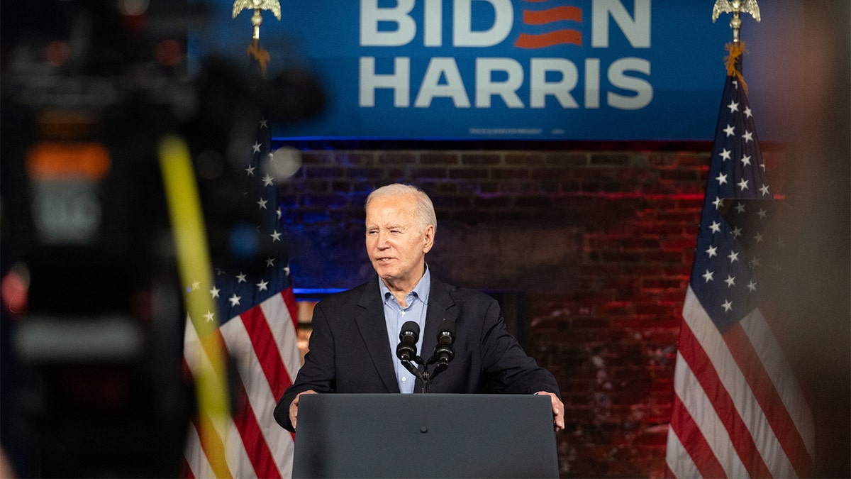 President Joe Biden speaking at lectern