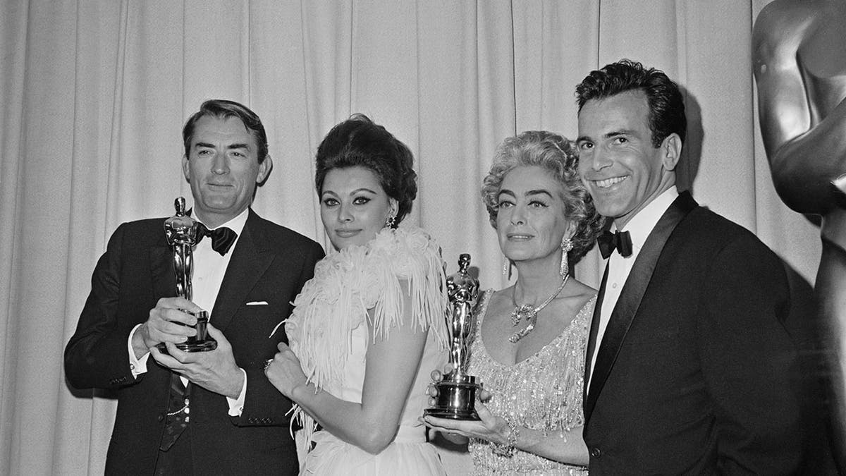 Joan Crawford with a group of Oscar winners