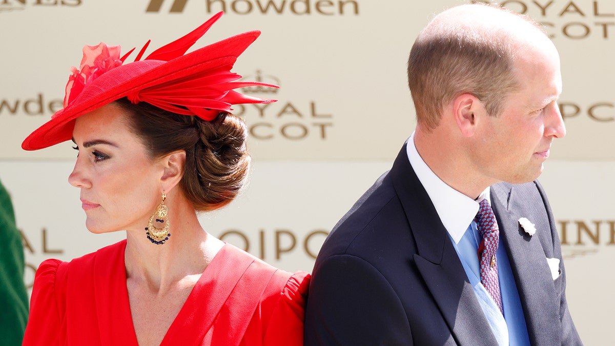 Kate Middleton and Prince William looking away from each other.