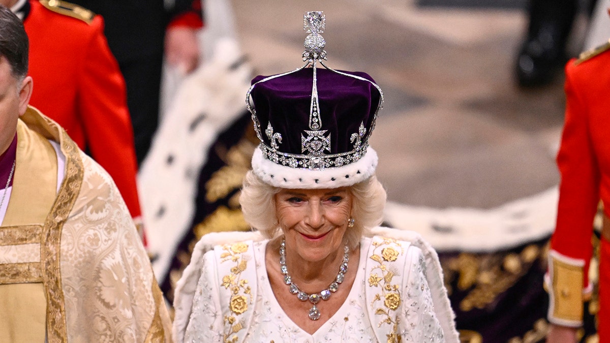 Queen Camilla smiling with her crown