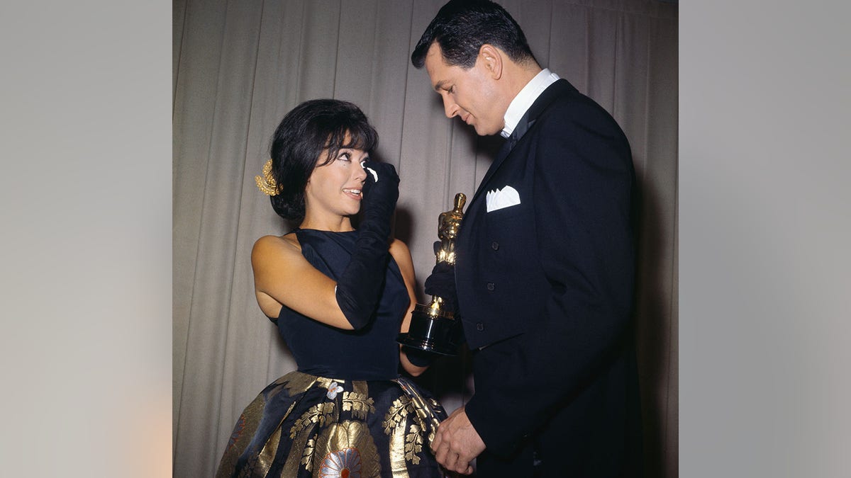 Rita Moreno accepting her Oscar
