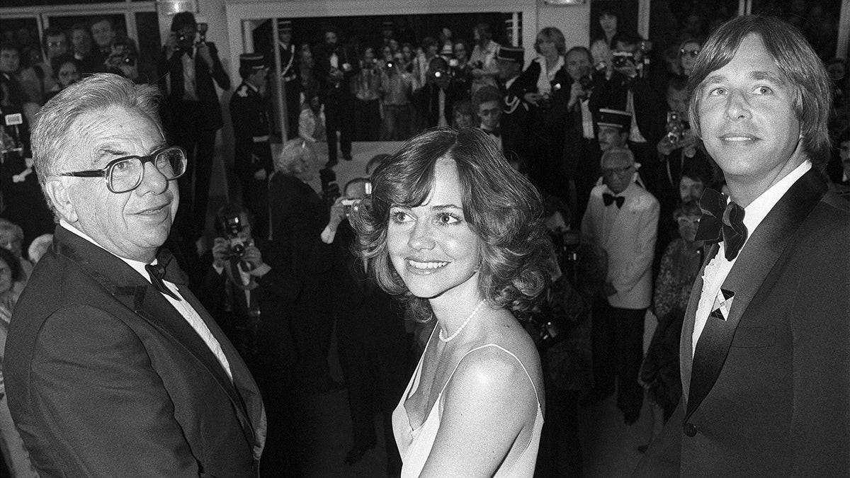 Sally Fields accompanied by two men in Cannes