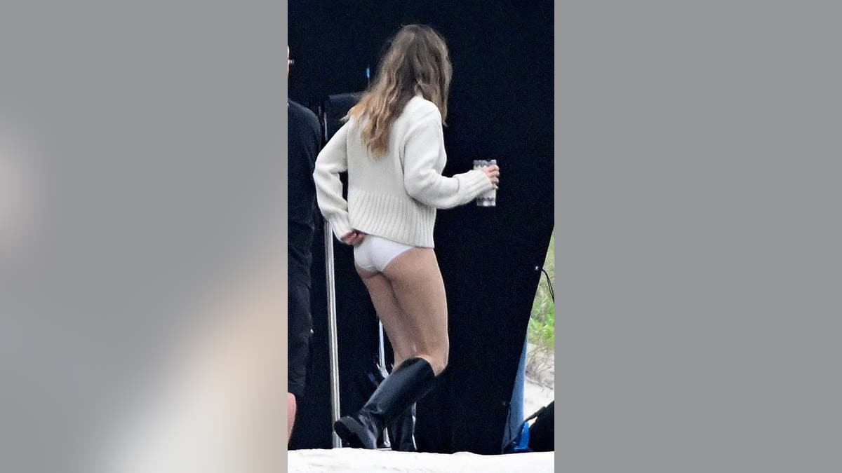 Gisele Bundchen has a wardrobe malfunction on set with her underwear showing