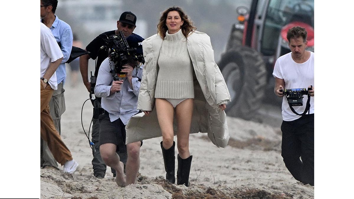 Gisele Bundchen has a wardrobe malfunction on set with her underwear showing