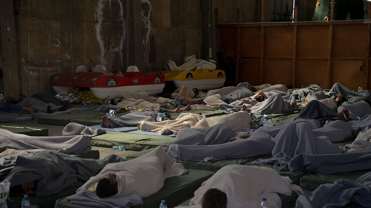 Migrants sleeping