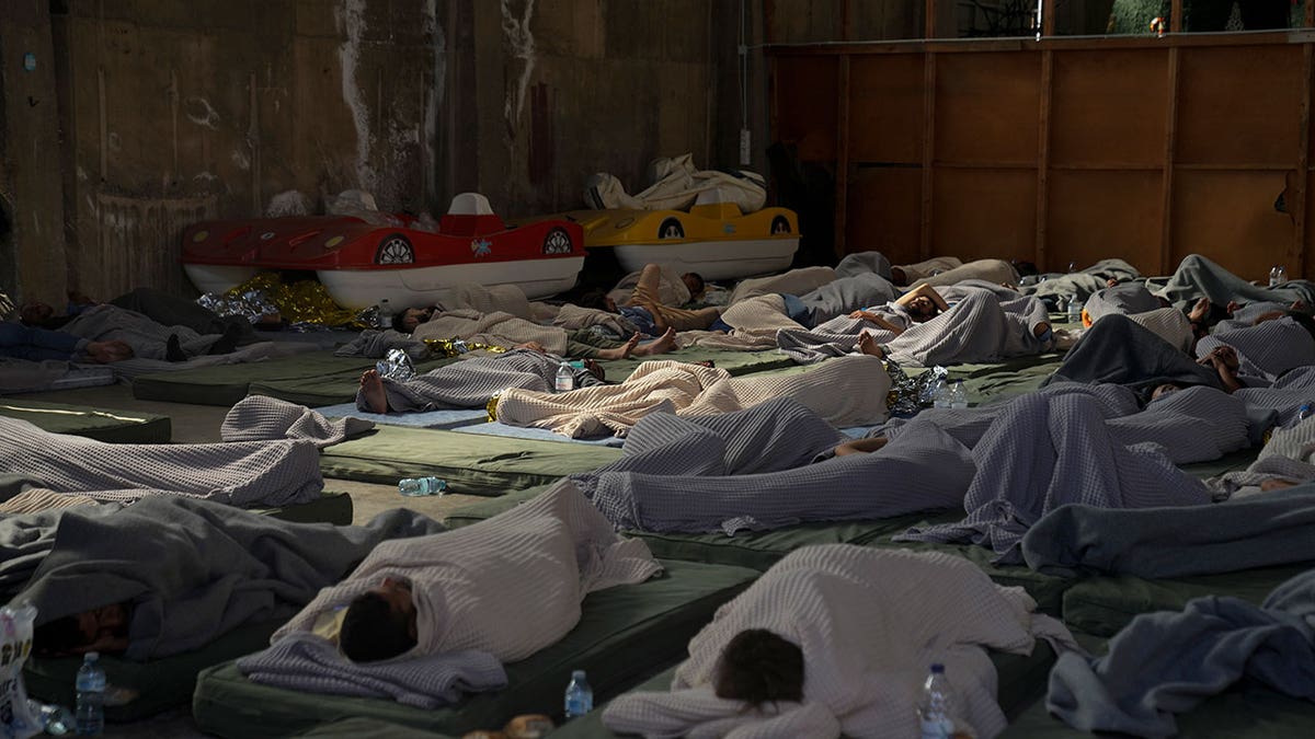 Migrants sleeping