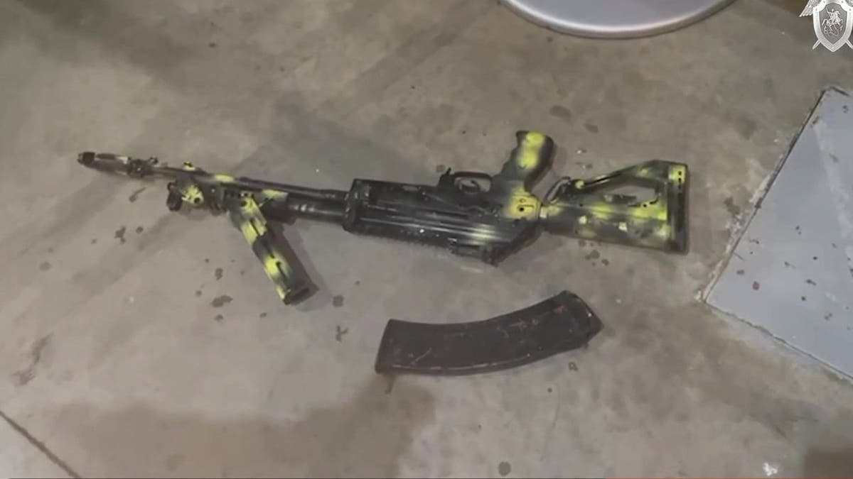 A gun on the floor after the Moscow terror attack