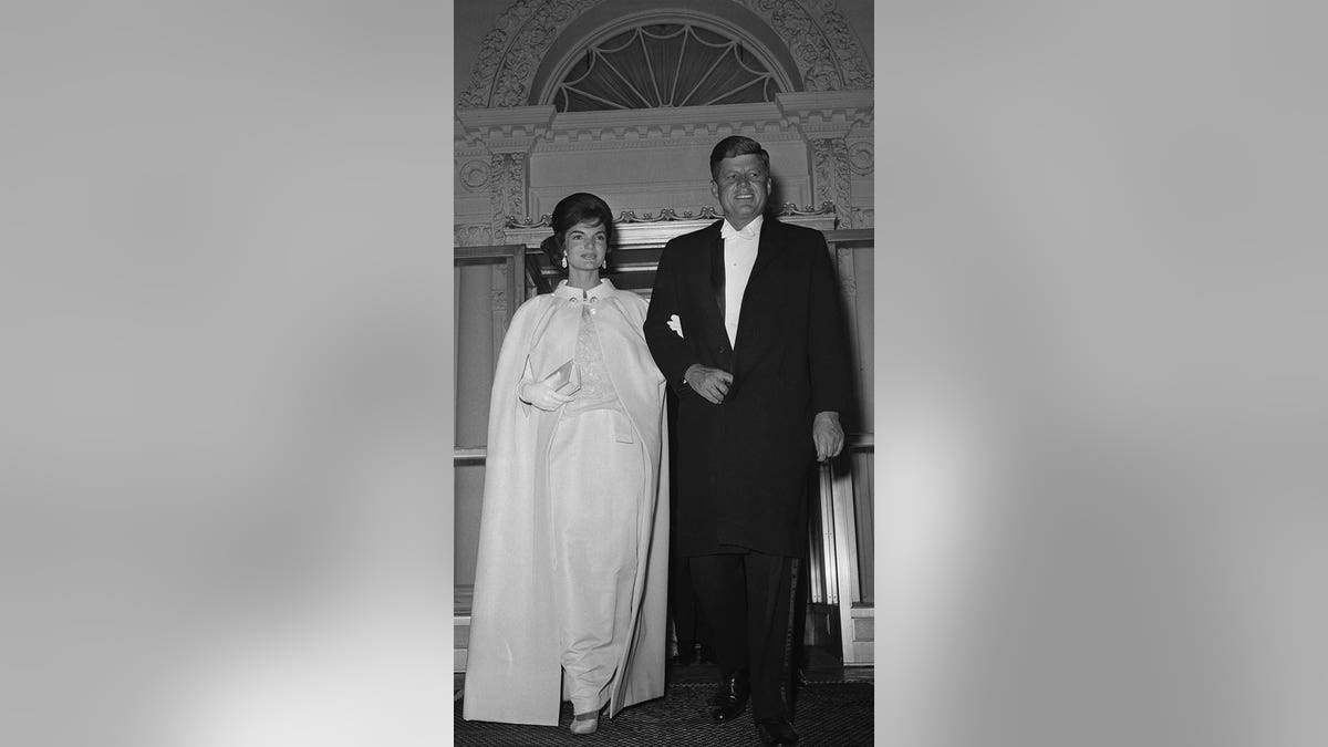 Jackie Kennedy wearing Oleg Cassini with JFK