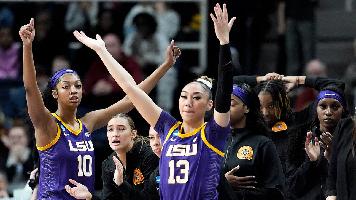 LSU players react during a game