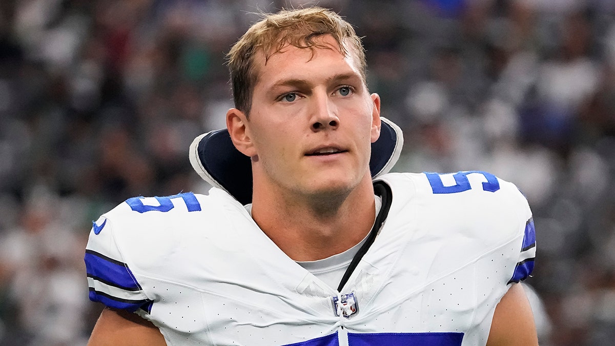 Leighton Vander Esch walks on field