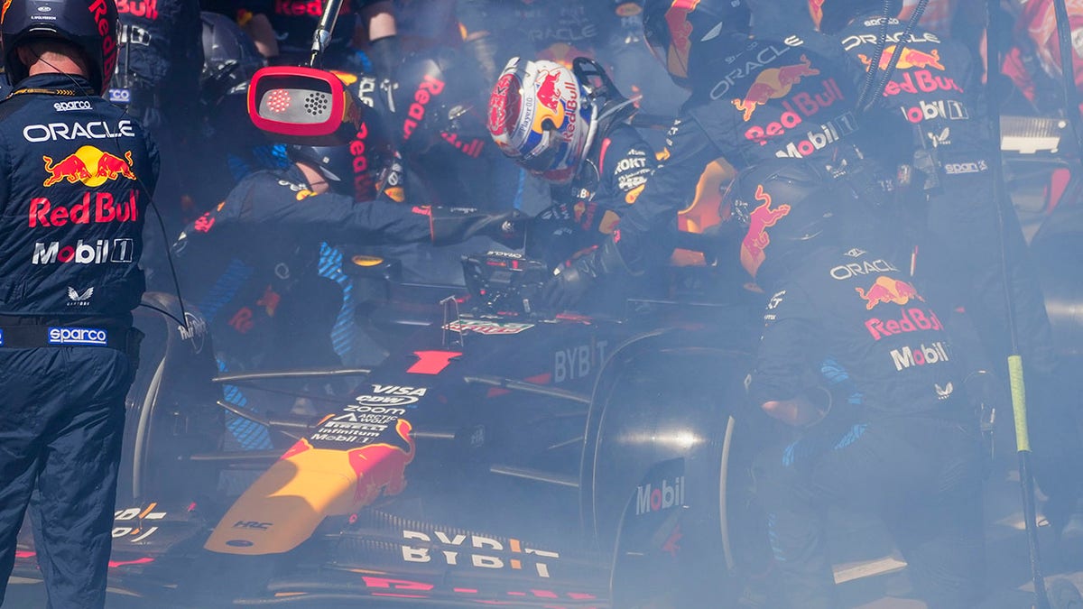 Max Verstappen's car smokes