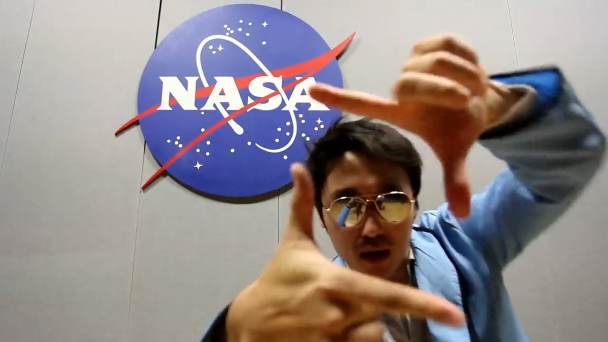 NASA Johnson Style screenshot shows Eric Sim dancing near NASA logo