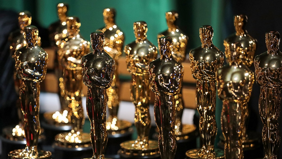 Photo of a collection of Oscar statutettes