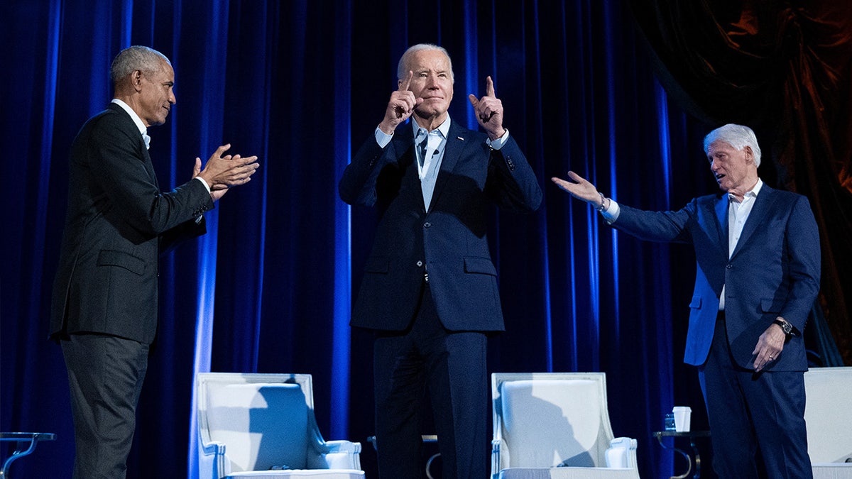 Obama, Biden and Clinton onstage