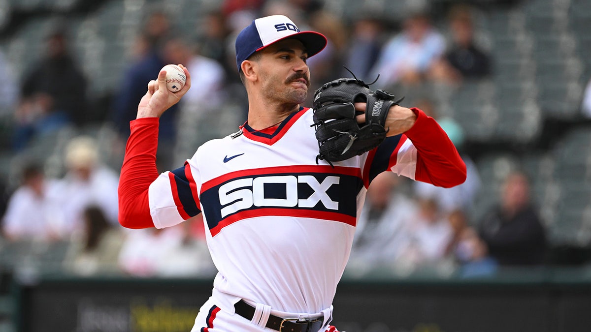 Dylan Cease throws a pitch