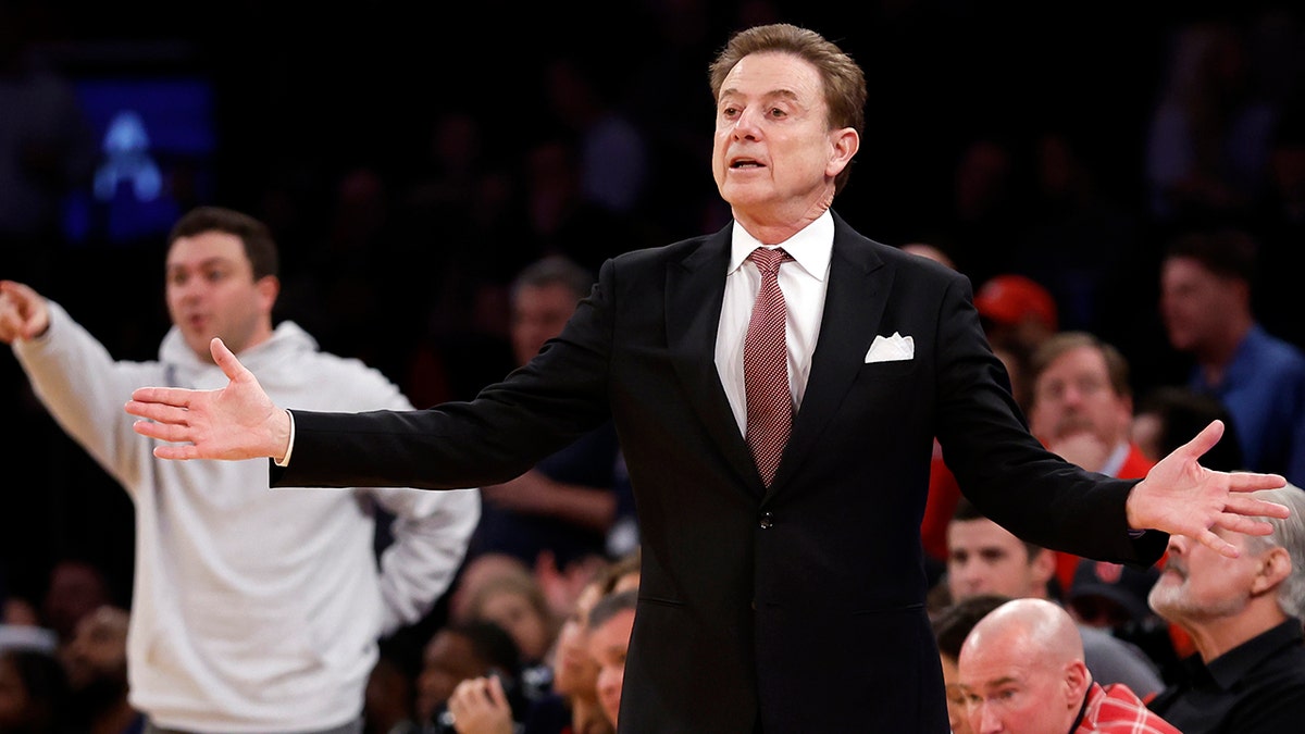 Rick Pitino coaches