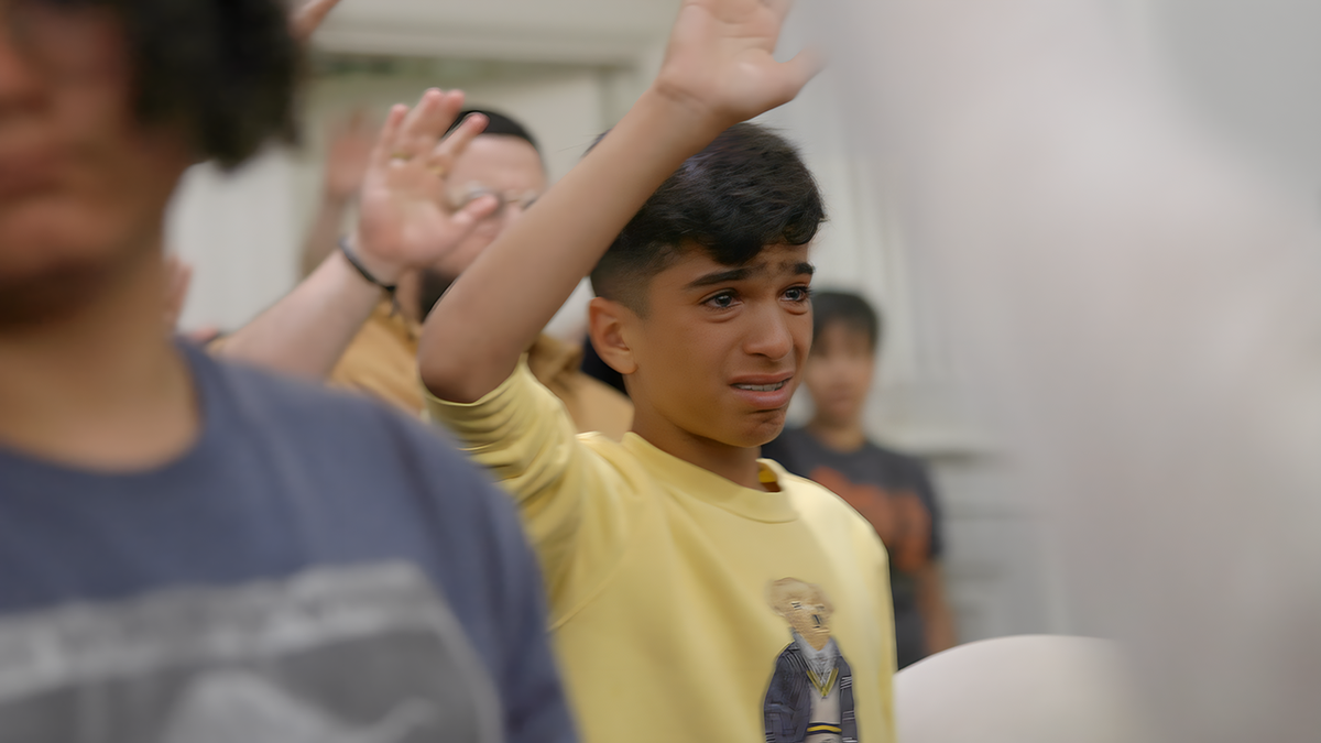 boy crying during movie