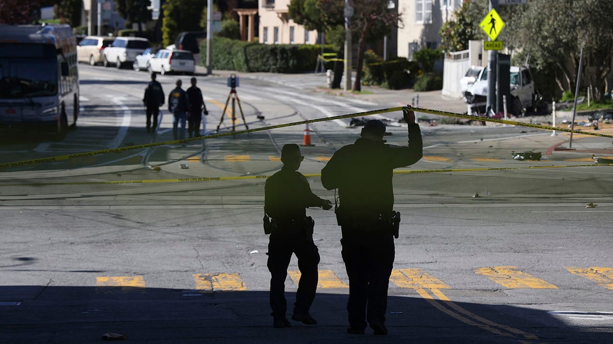 San Francisco authorities investigate the crash site