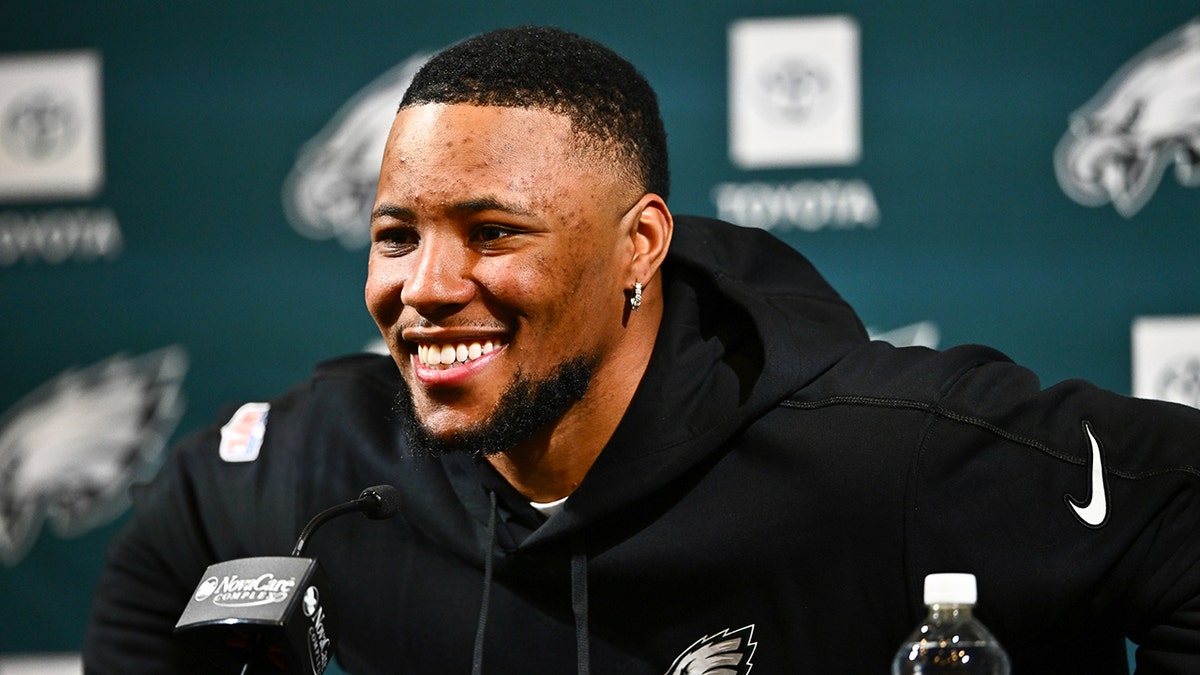 Philadelphia Eagles running back Saquon Barkley speaks during a press conference after signing with the team.